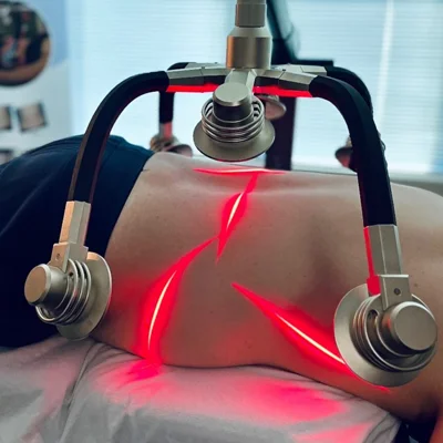 Zerona Z6 laser system being used on a patient's midsection